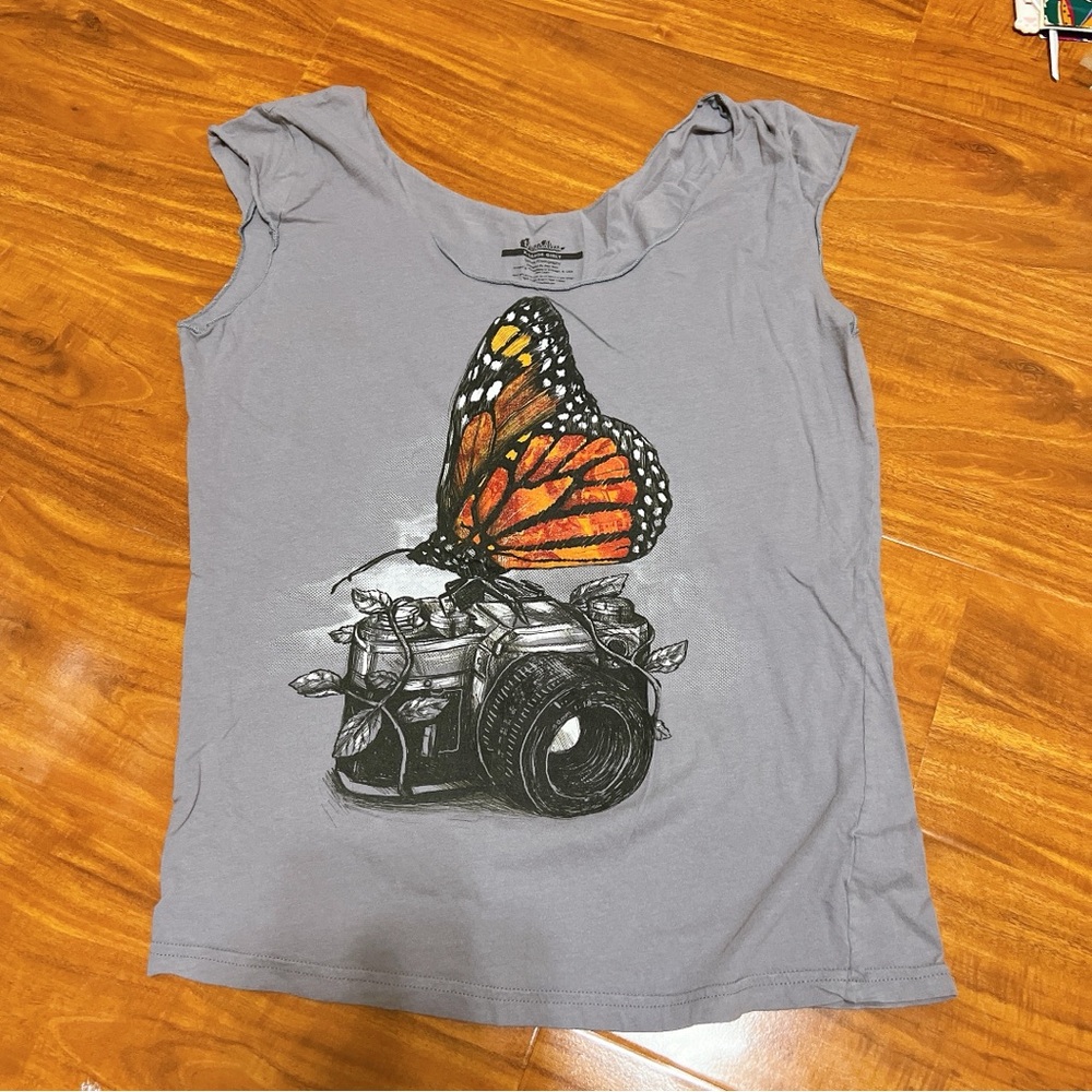Threadless Girl Tee Butterfly sitting on a Film Camera